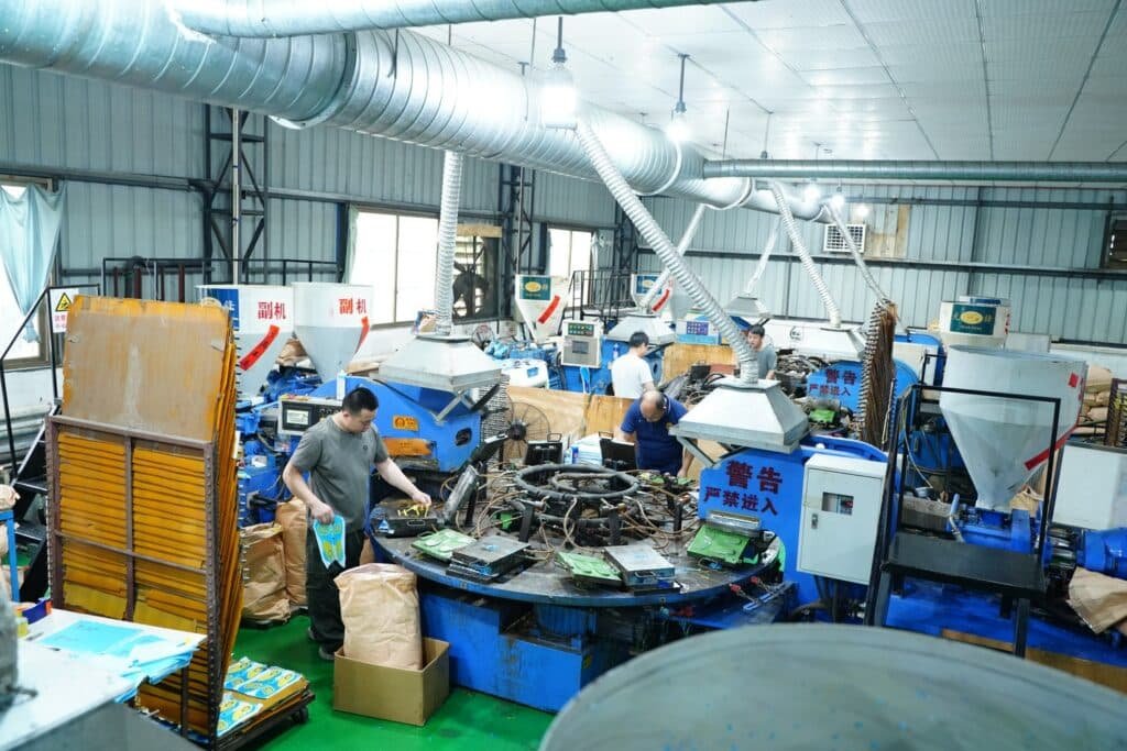 BSCI audited insole manufacturing factory showing workers operating molding machines and producing custom insoles for OEM and ODM footwear brands.